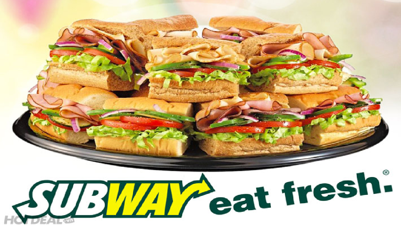 Platter of fresh Subway sandwiches.