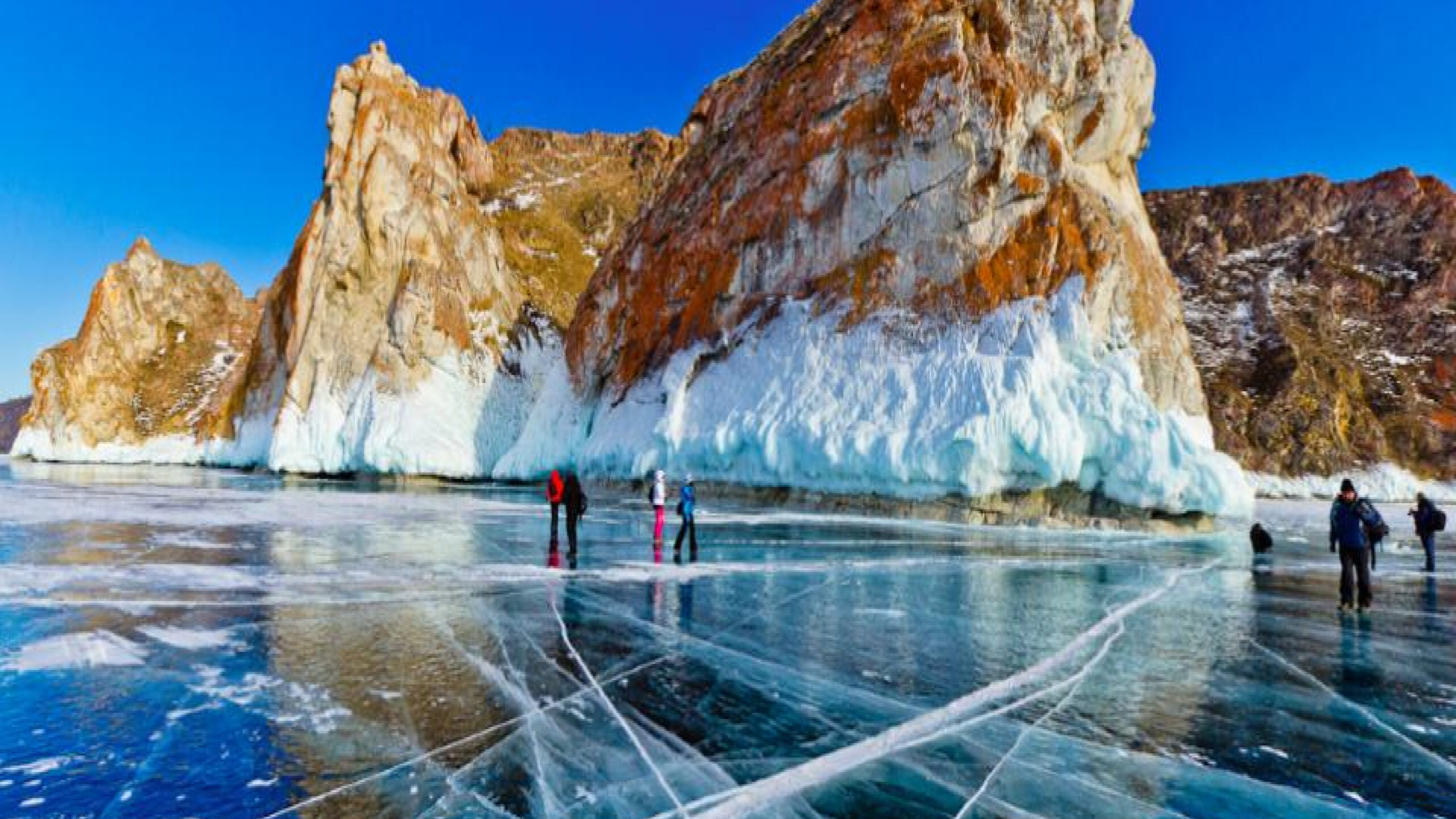 Ice skating on a frozen lake.
